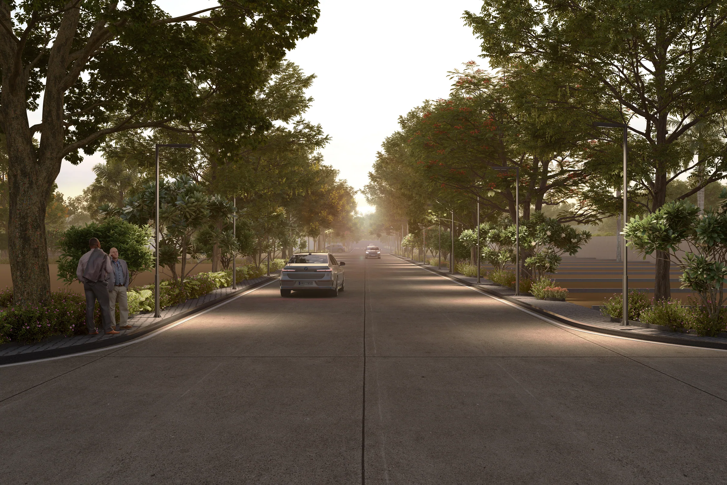Wide black-topped internal road at evening